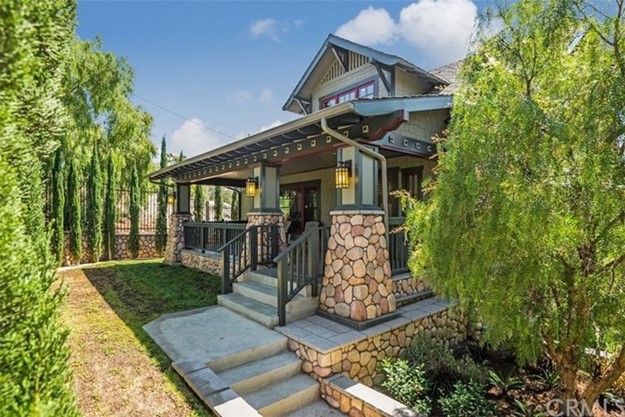 Image of a homes front porch and yard