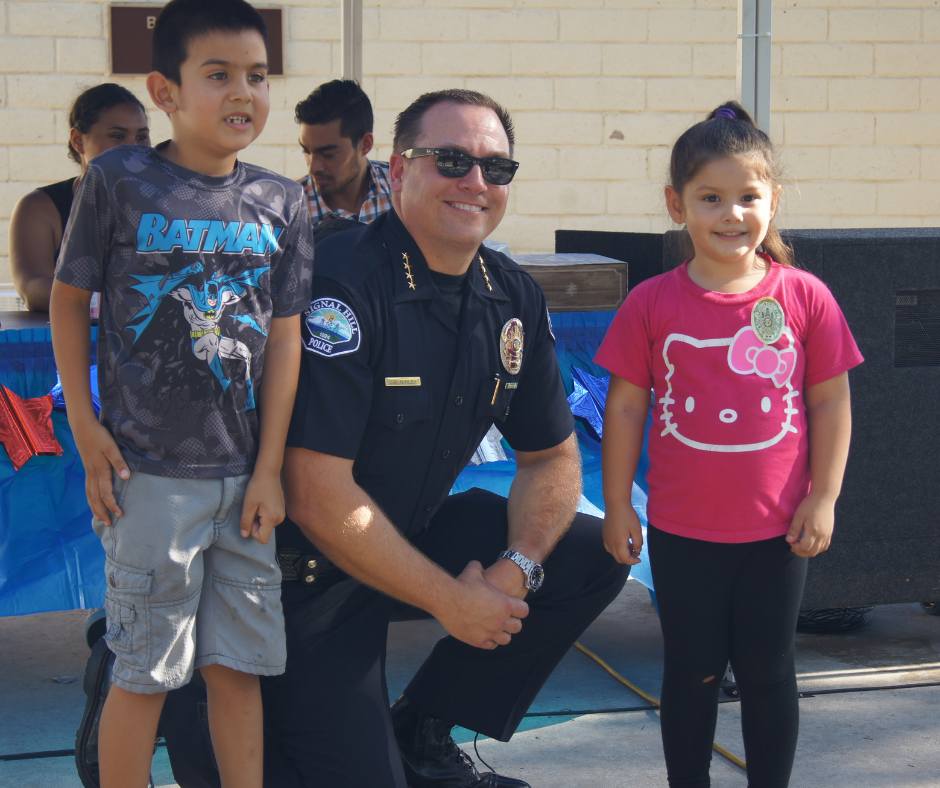 Chief Poses With Kids During National Night Out 2018